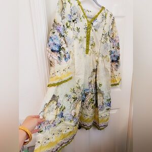 Floral women outfit with Blue and Green Accents and lace detailing